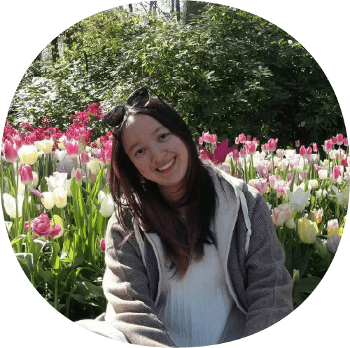 Happy student in a flower field